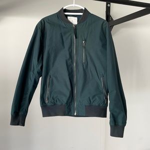 Men’s bomber jacket in dark green. Size M.